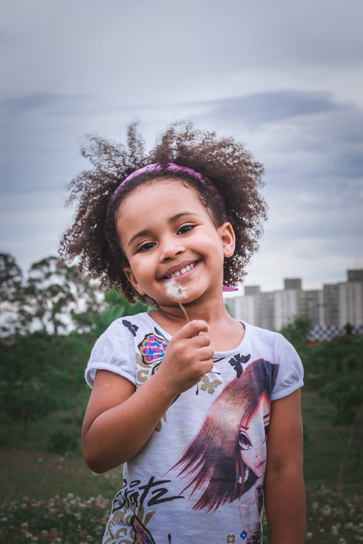 Little Girl With a Dandelion