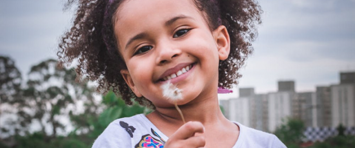 Little Girl With a Dandelion